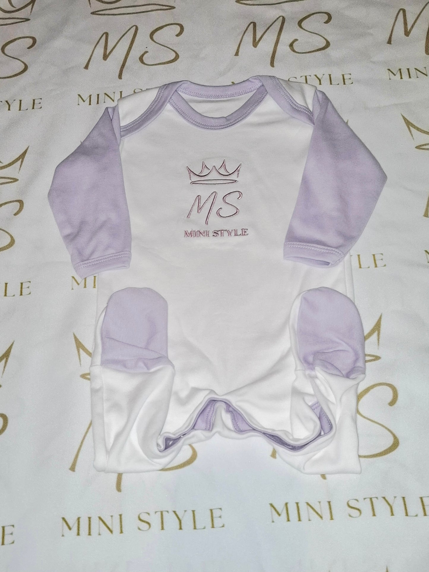 Lilac and white sleepsuit