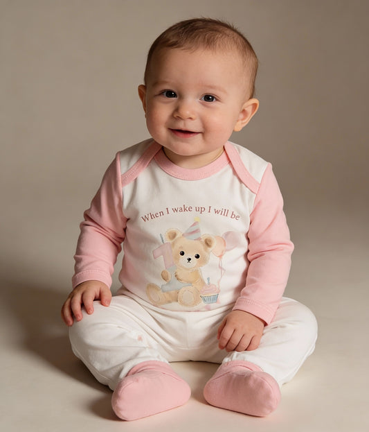 Pink 1st birthday sleepsuit