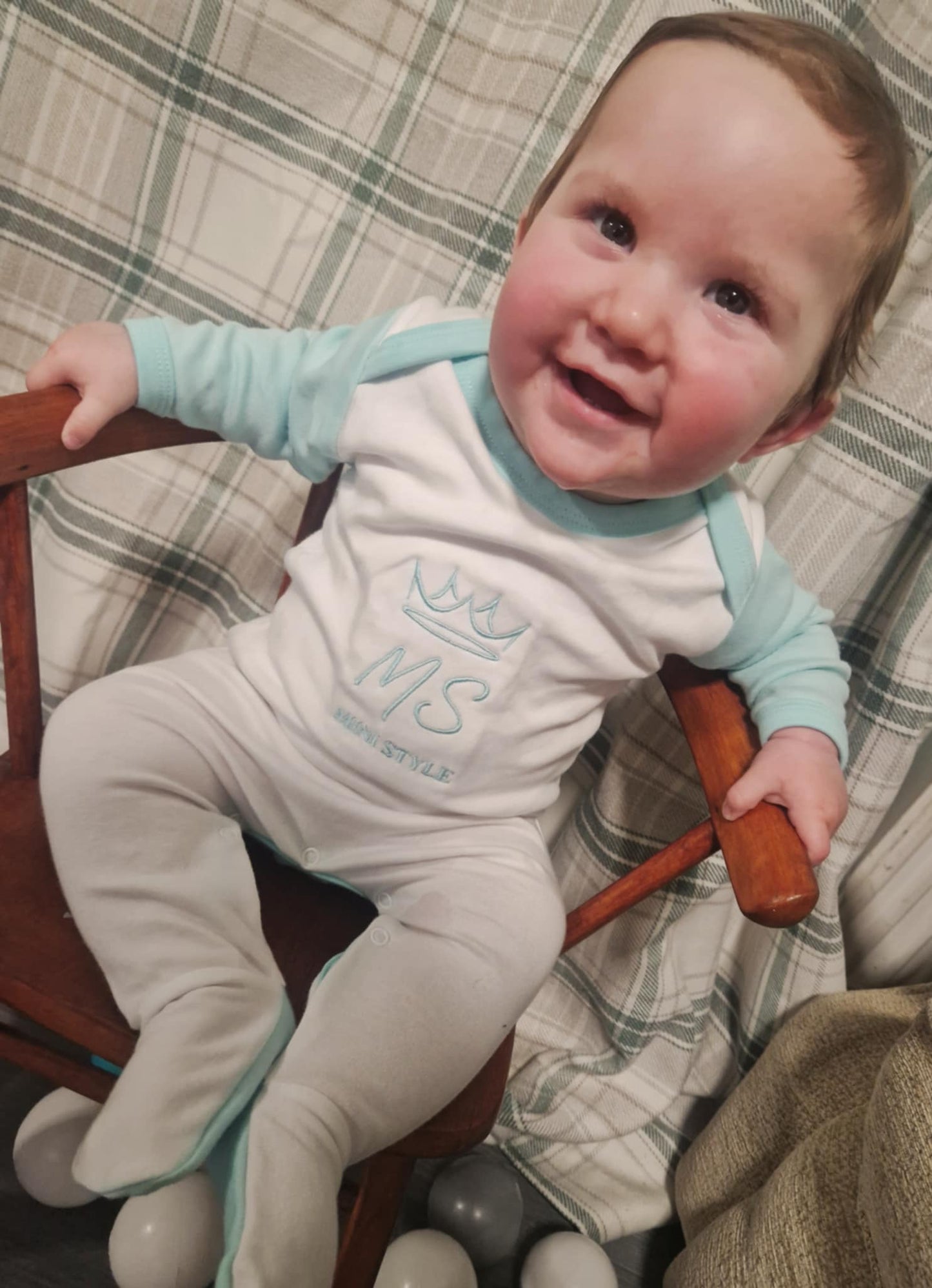 Mint and white sleepsuit