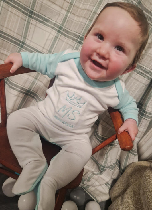 Mint and white sleepsuit