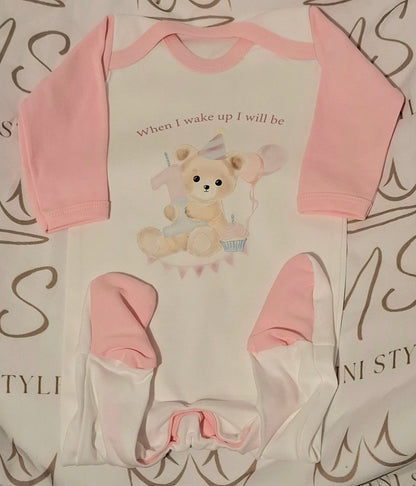 Pink 1st birthday sleepsuit
