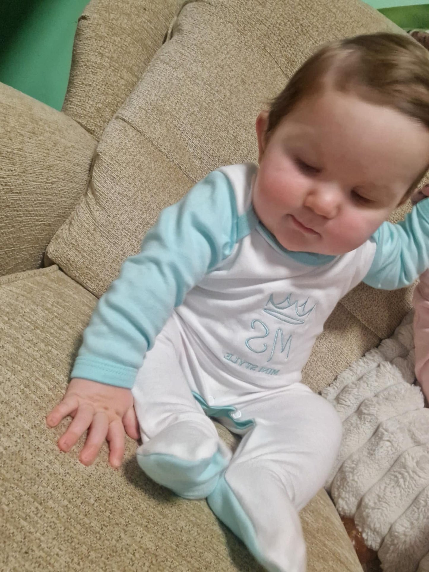 Mint and white sleepsuit